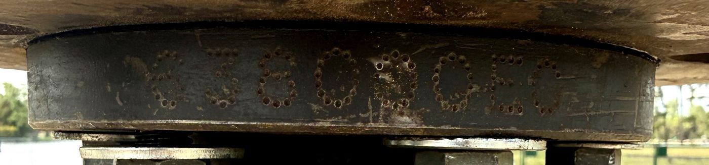 Rig hub with 638000EC dot-punched into the steel
